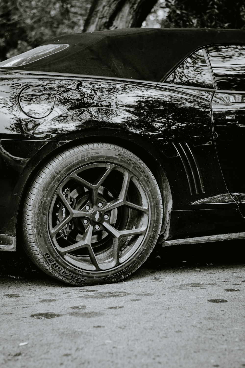 black car with chrome wheel