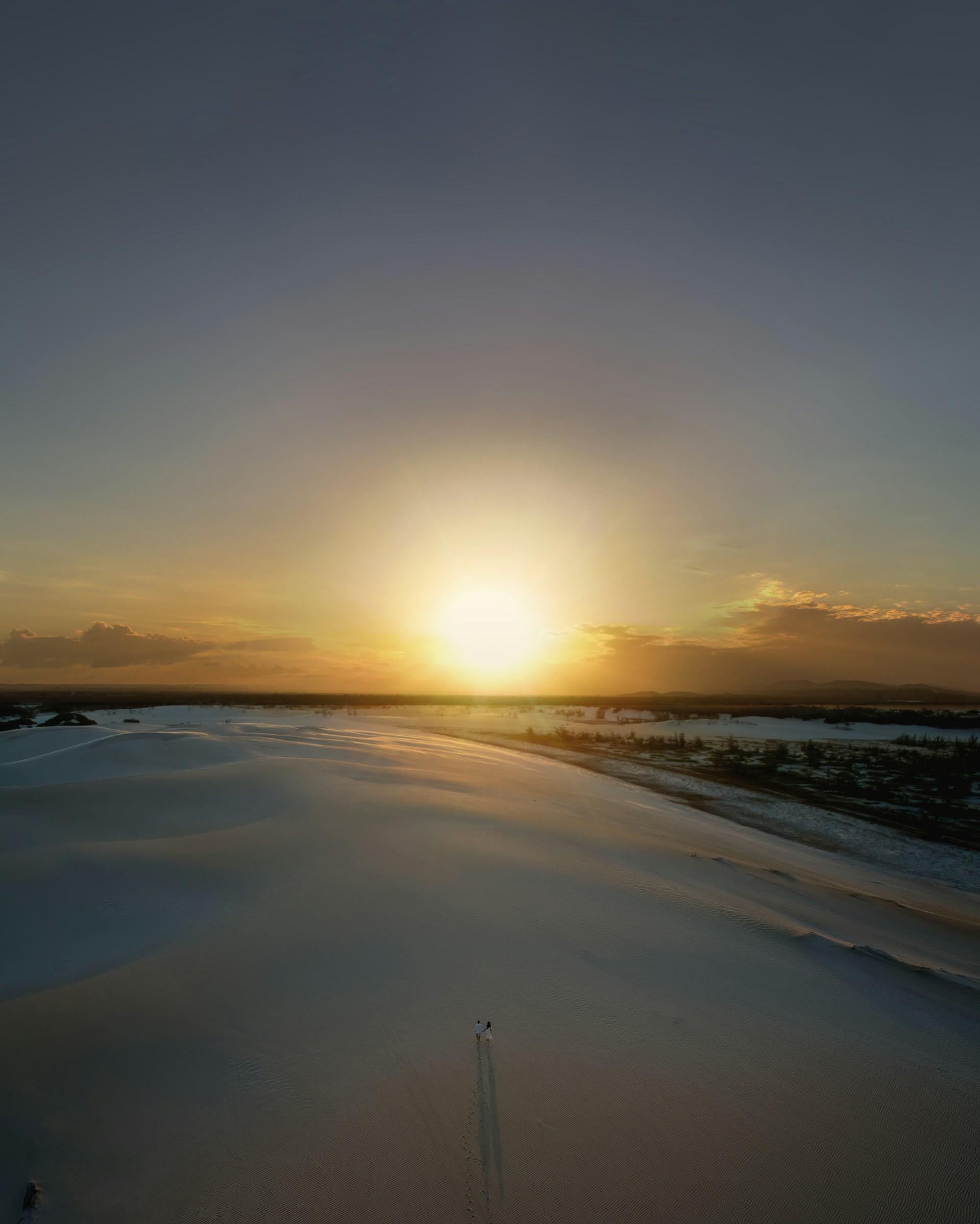 body of water during sunset
