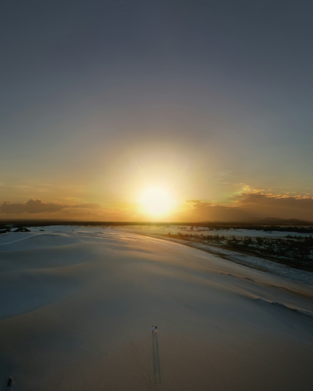 body of water during sunset