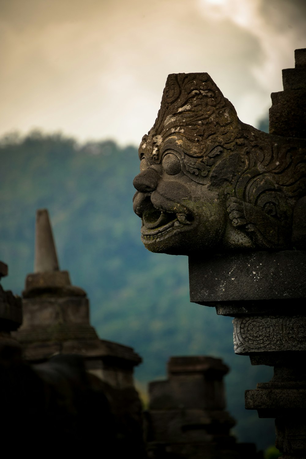 black concrete statue during daytime