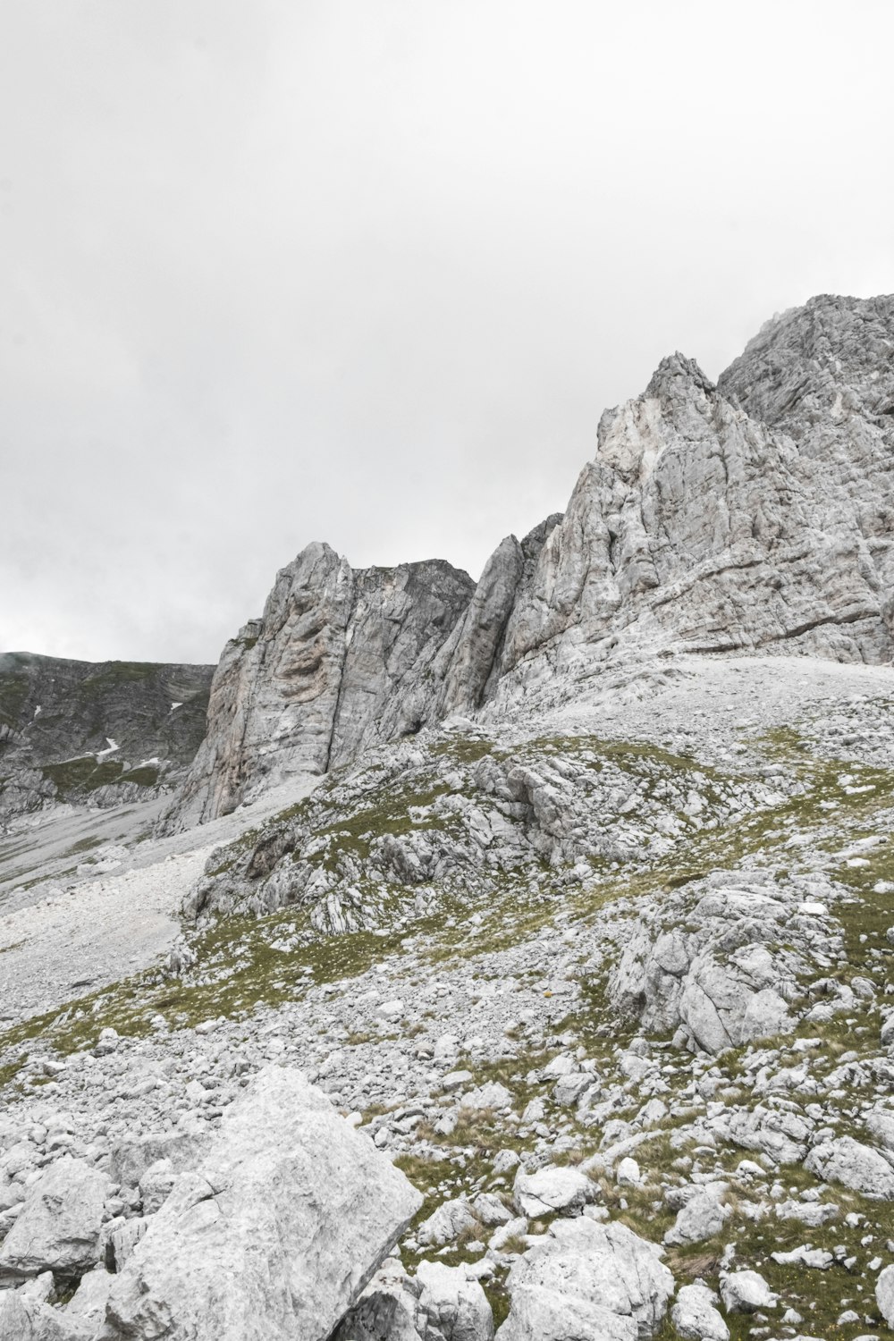 gray rocky mountain under white sky during daytime