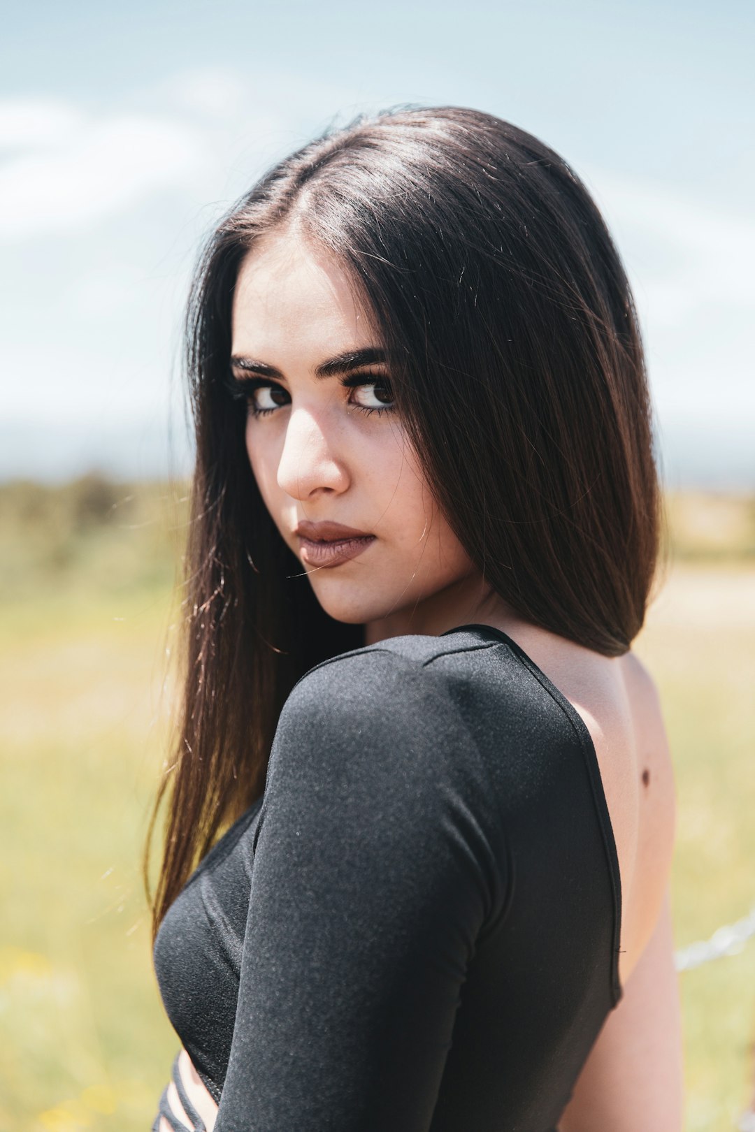 woman in black tank top