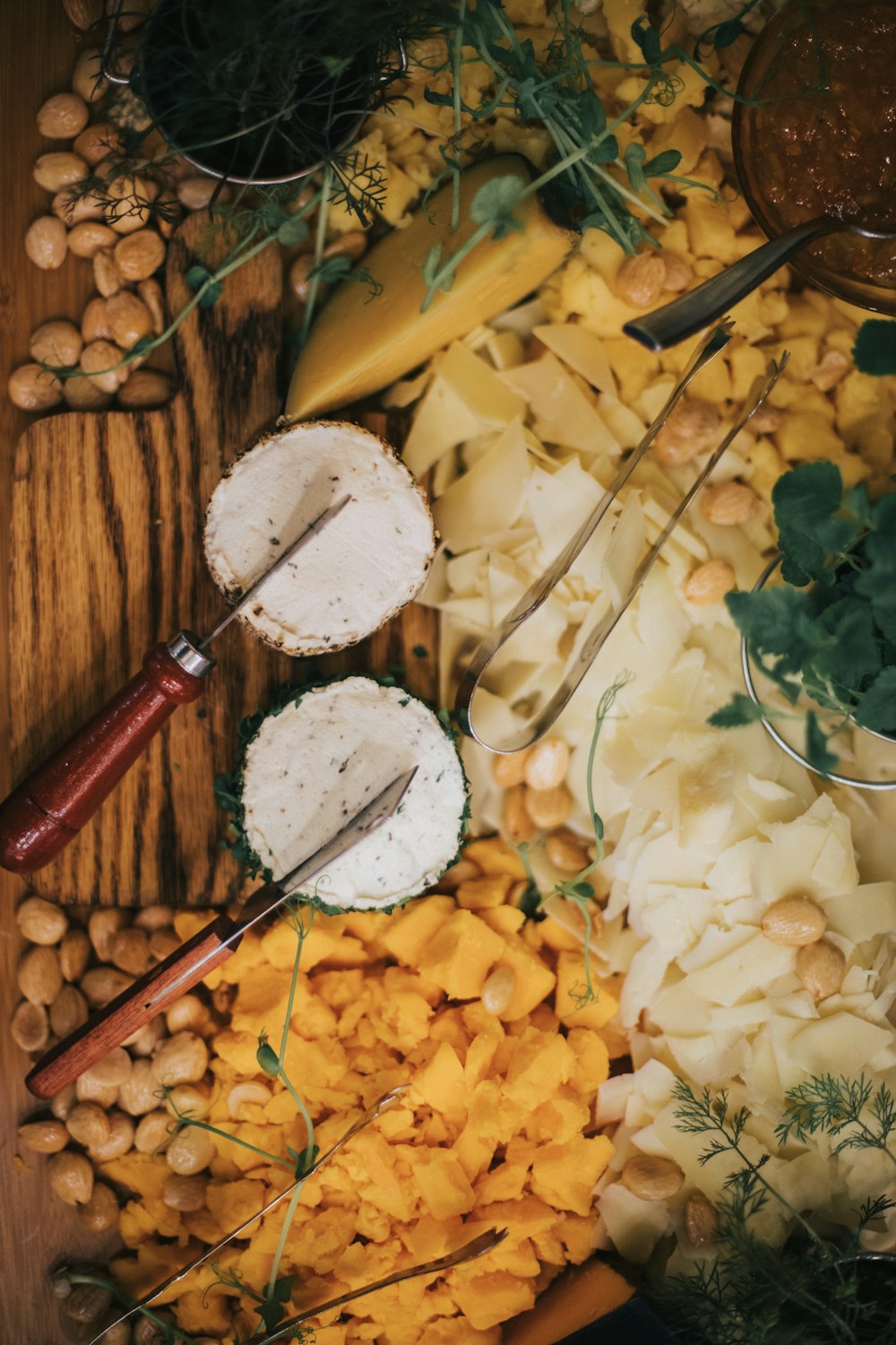 white and brown round decor beside red and yellow hand tool