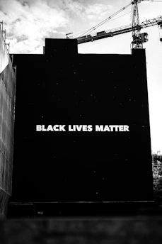a black lives matter sign on the side of a building