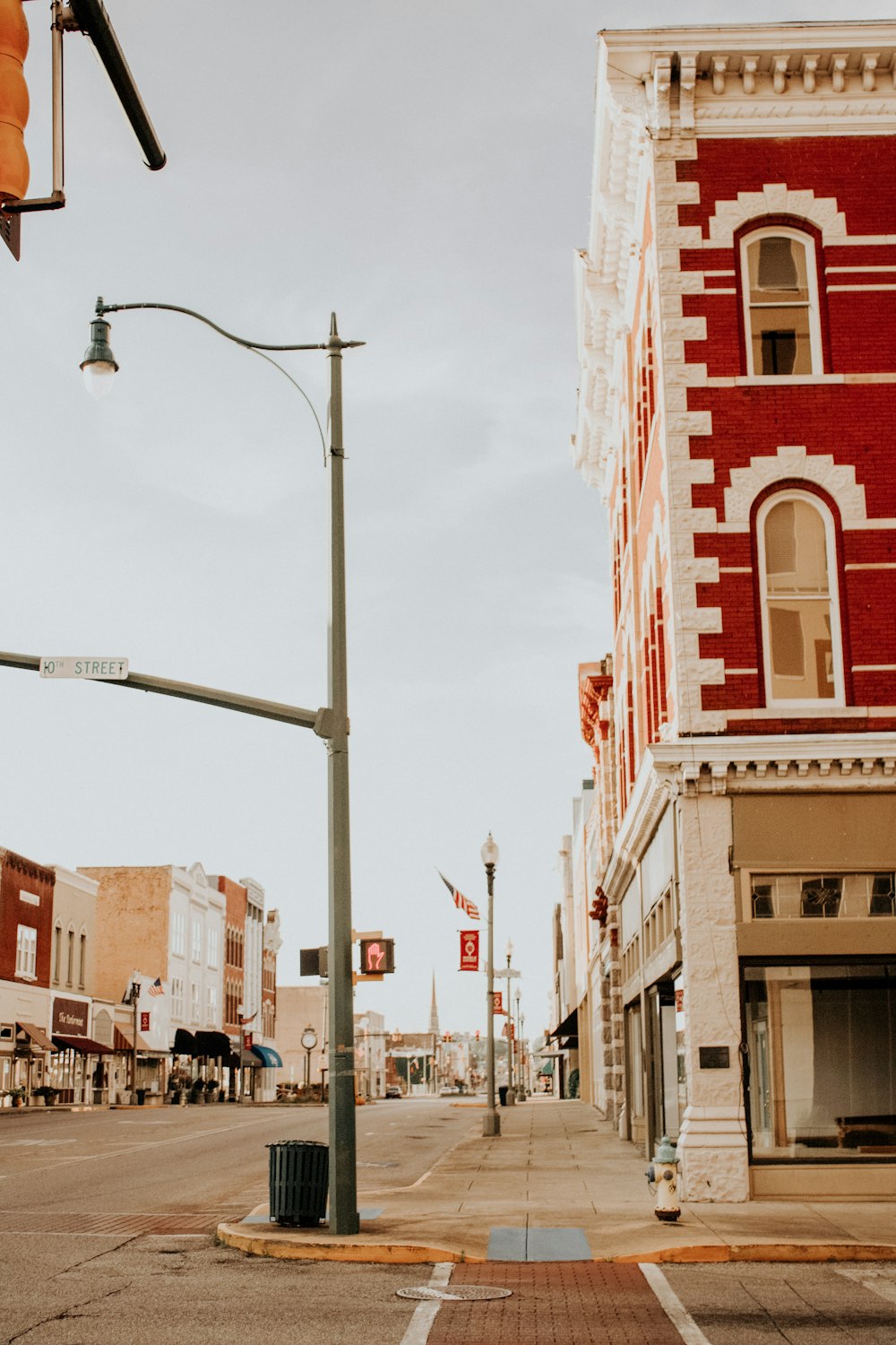 red brick building near street light during daytime