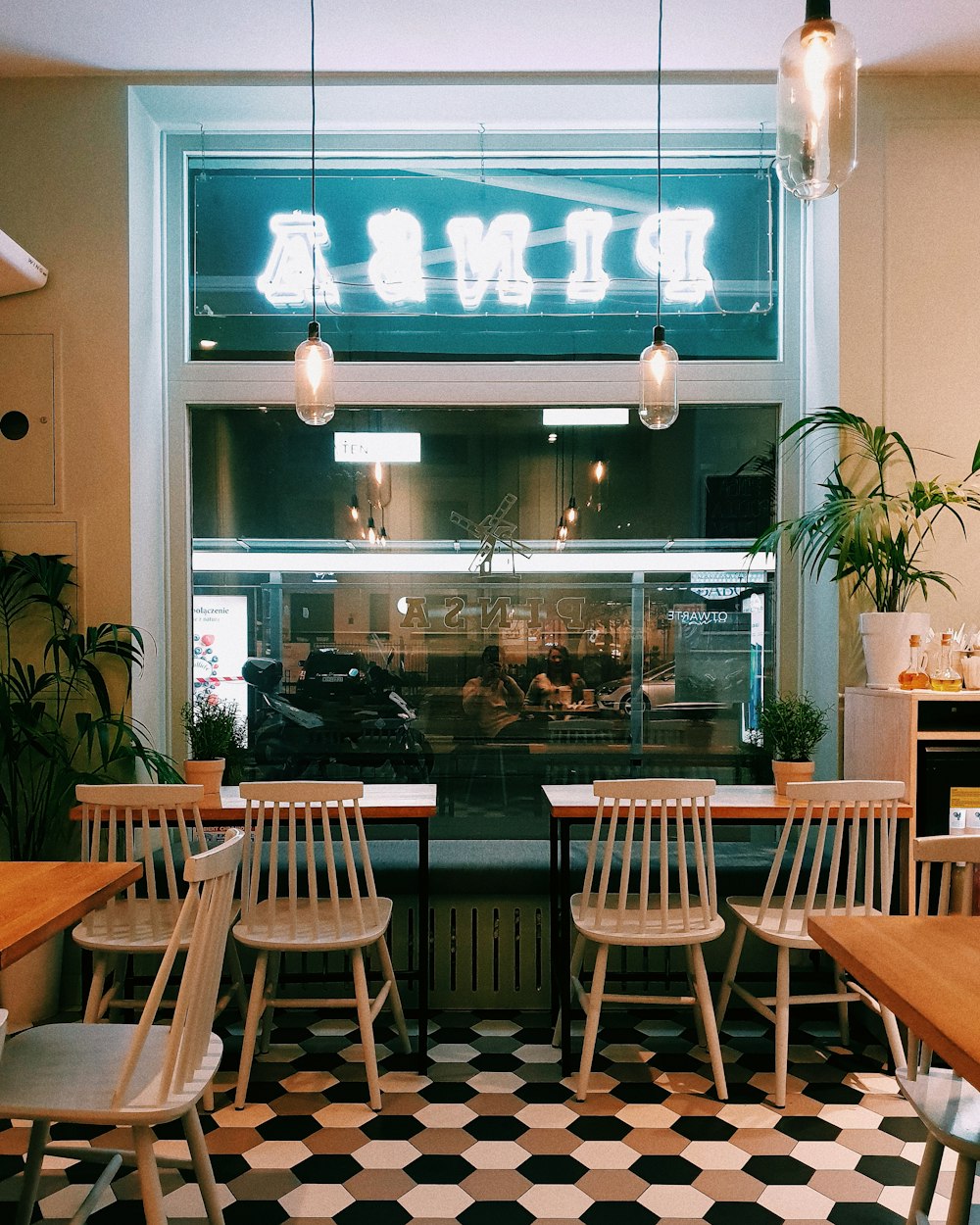 brown wooden table and chairs