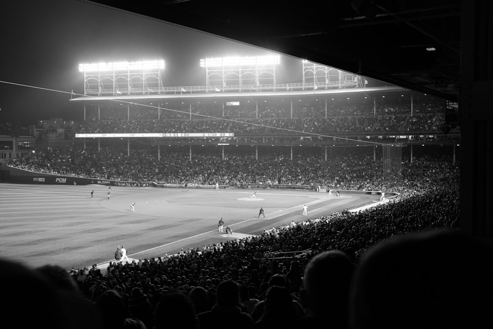 people watching football game on stadium