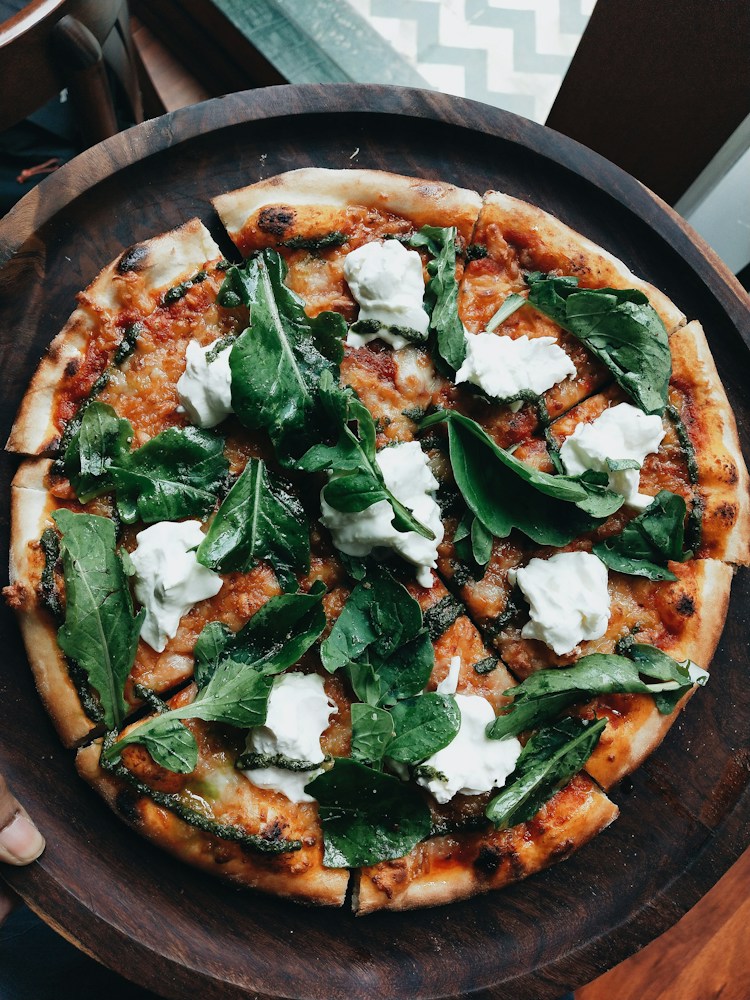 Pizza being prepared