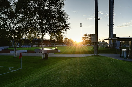 Evening view of the sports hub’s multiple turfs, bathed in the warm glow of setting sun and ready for the next game.