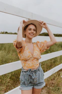 Still image from Penelope’s YouTube video showing her in a rustic country setting.