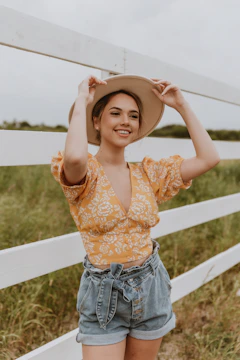 Still image from Penelope’s YouTube video showing her in a rustic country setting.