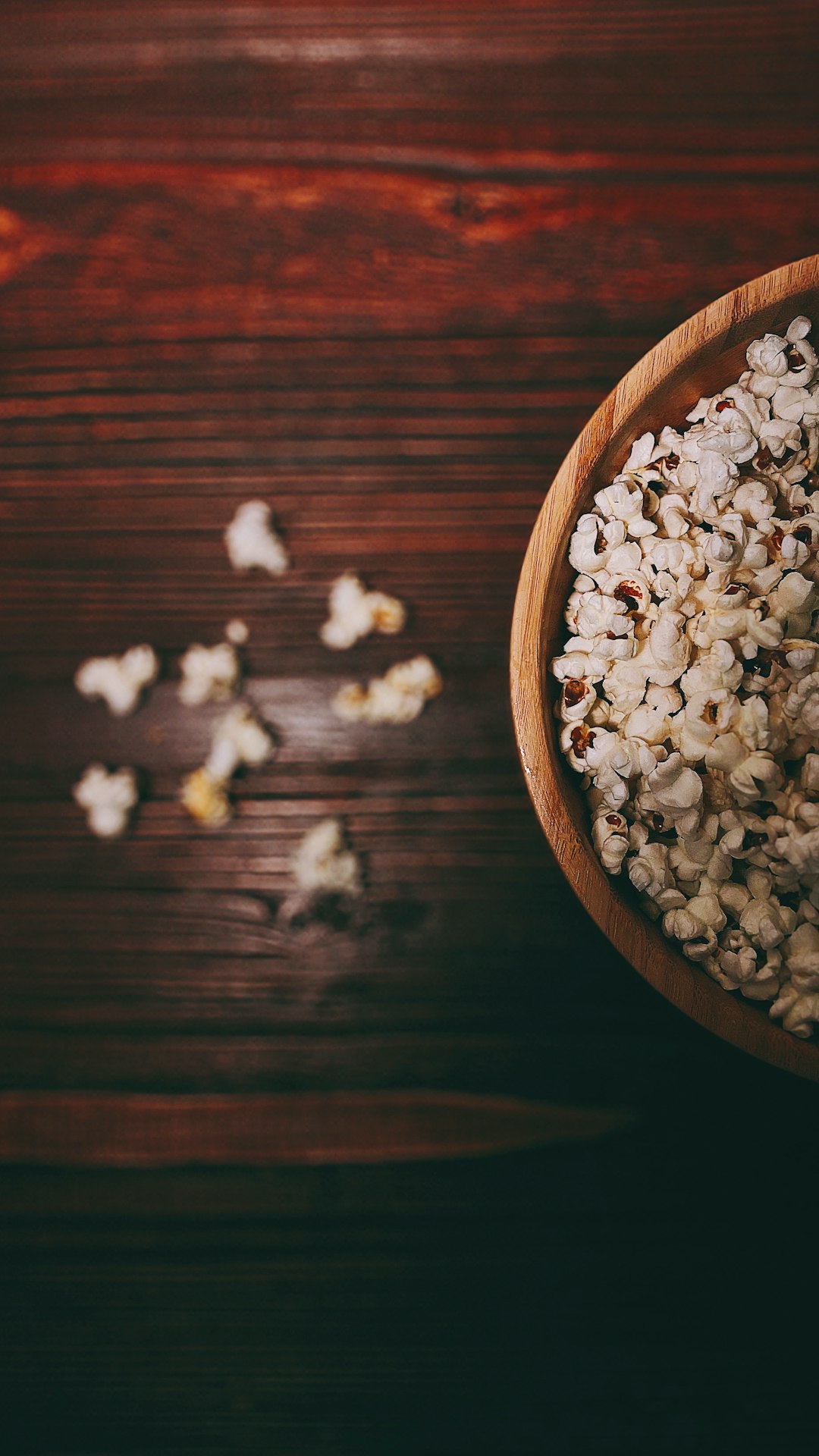 white popcorn on brown wooden table