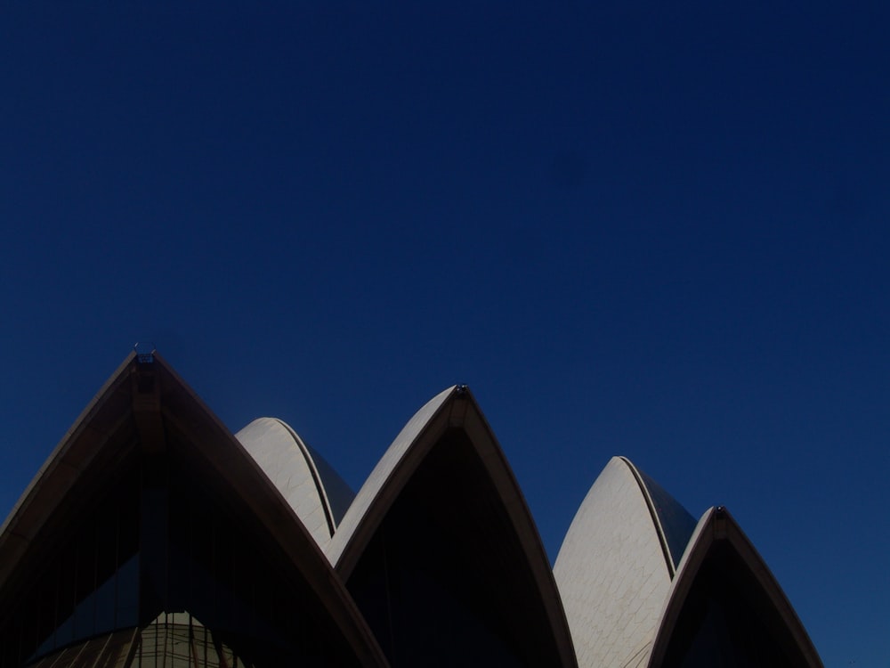 white concrete building under blue sky during daytime