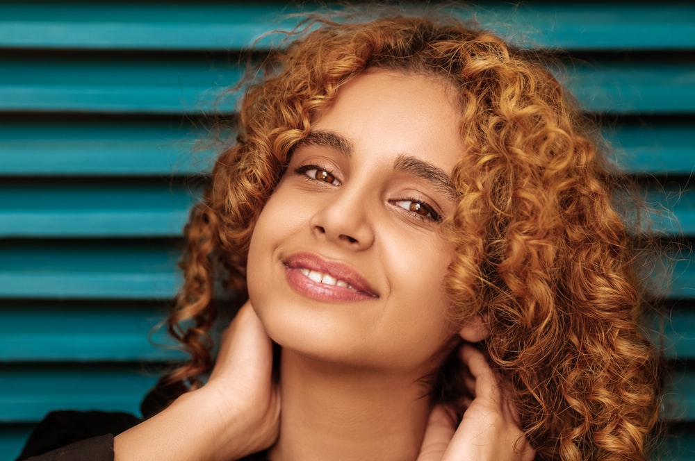 woman with brown hair smiling