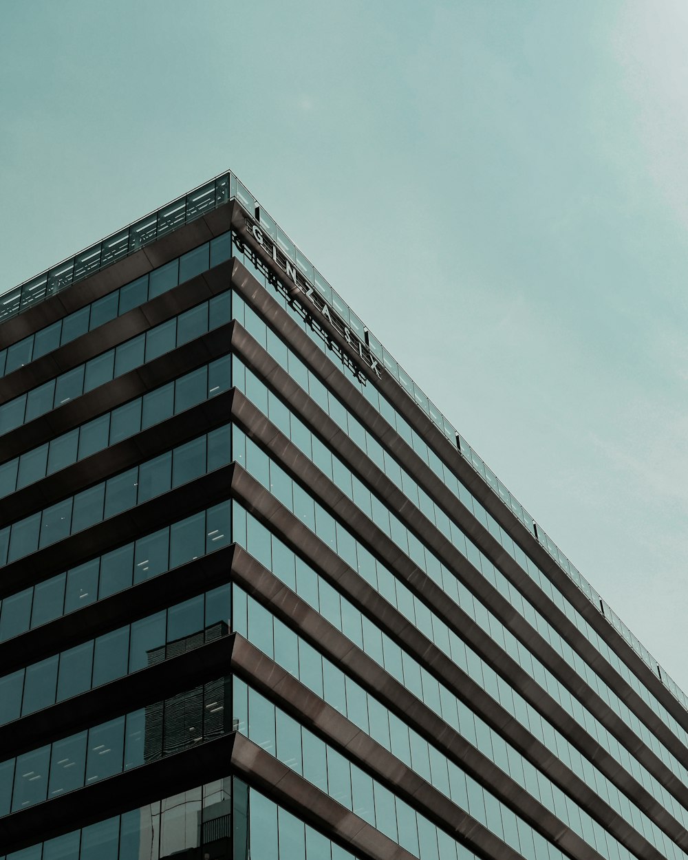 brown concrete building under blue sky during daytime