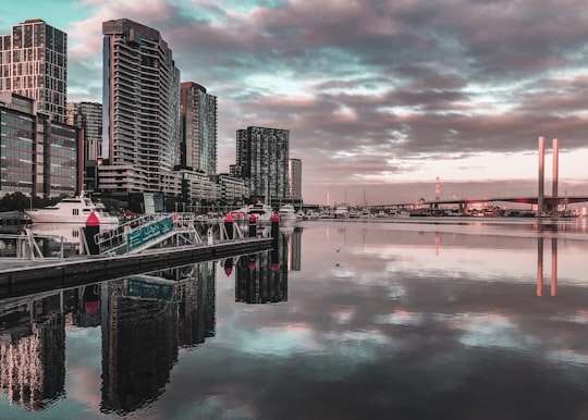 city skyline across body of water during night time in Docklands VIC Australia