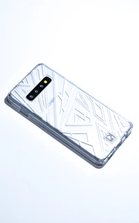User holding a phone with a transparent case, showing off the device’s original design and color