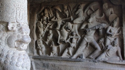 Mesopotamian cylinder seal rolling out detailed mythological scenes.