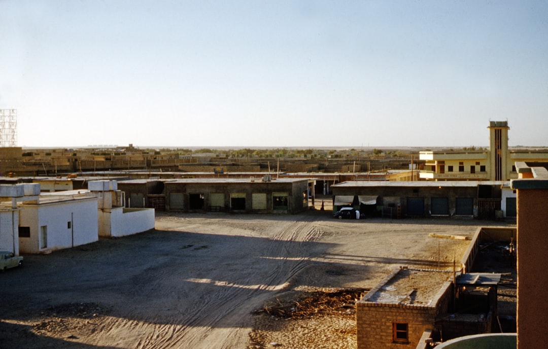 white and gray building under white sky during daytime, kuwait, old photo, old photograph, digitised slides, saudi arabia, 1950s, 1960s, 50s, 60s, vintage, arabia, uae, middle east,</p></figure><p>