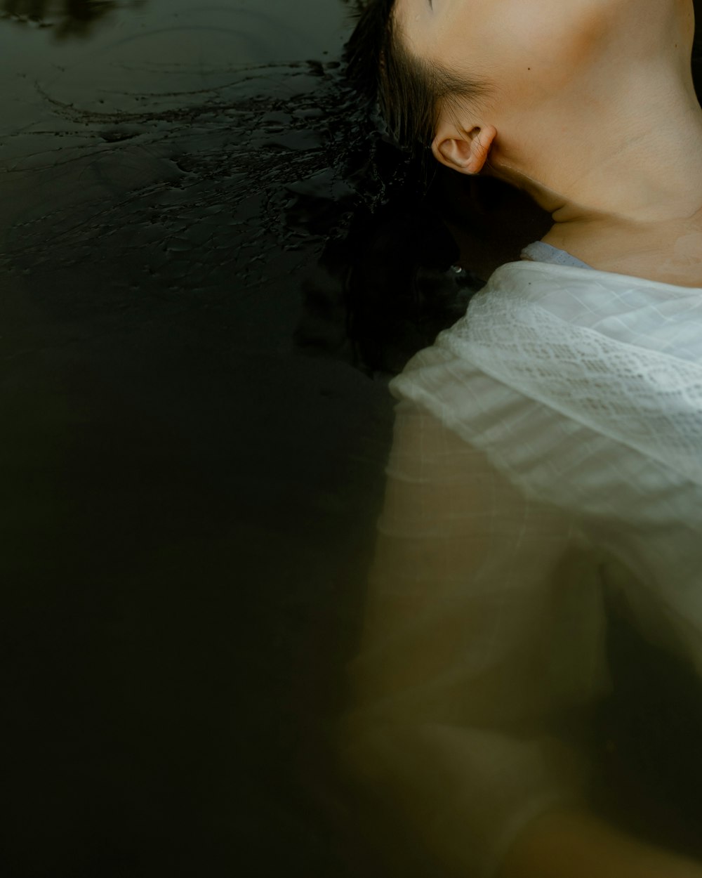 woman in white off shoulder shirt