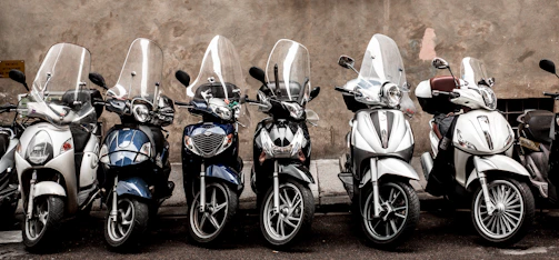 blue and white motor scooter