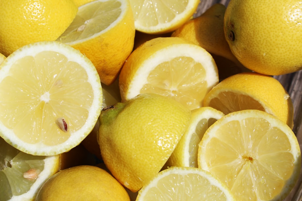 yellow lemon fruit on white ceramic plate