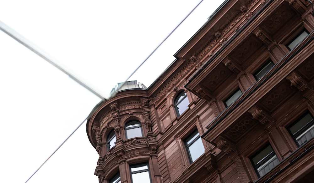 brown concrete building under white sky during daytime