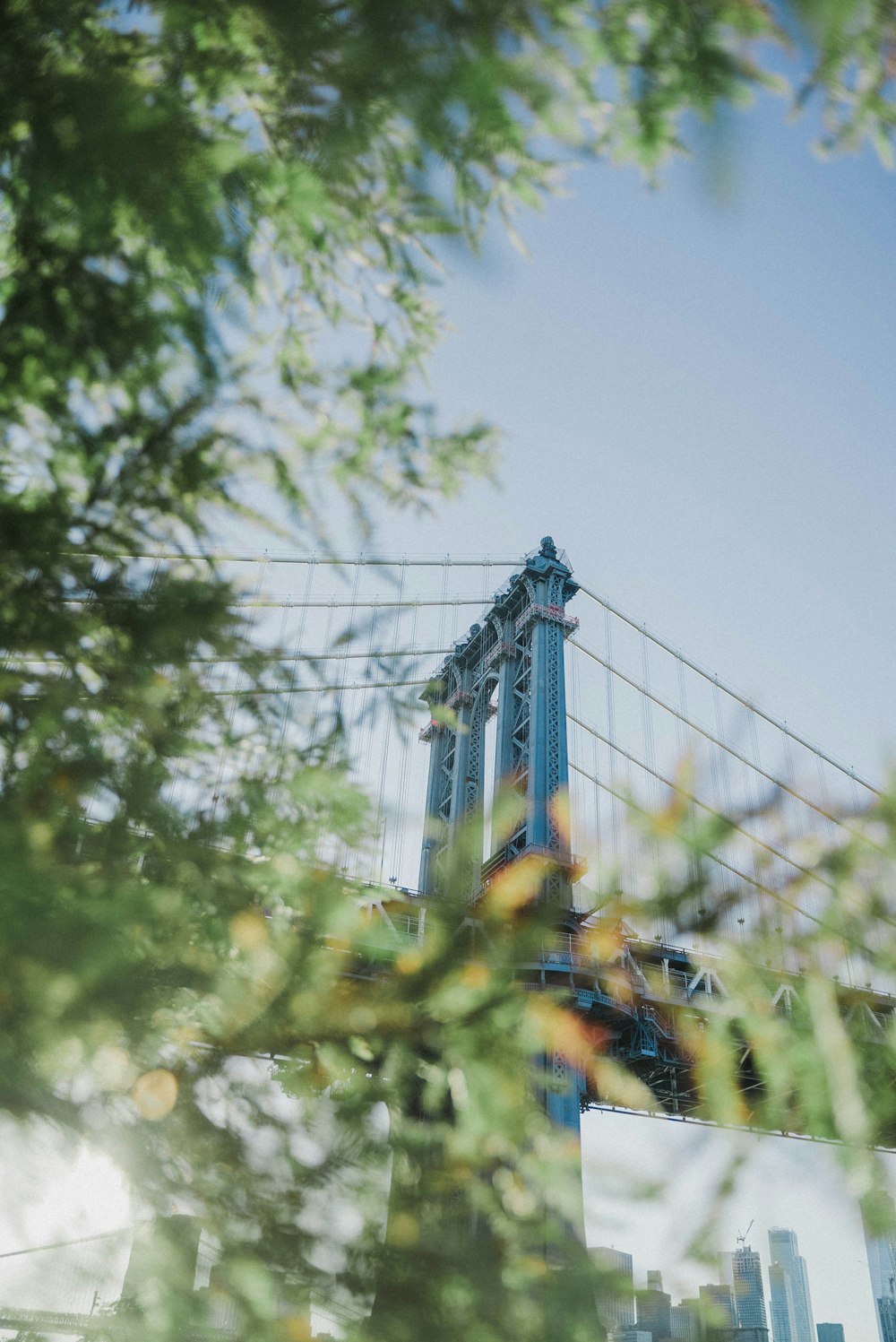 blue and white bridge under blue sky during daytime