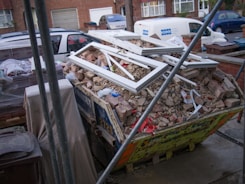 white plastic crate with assorted items