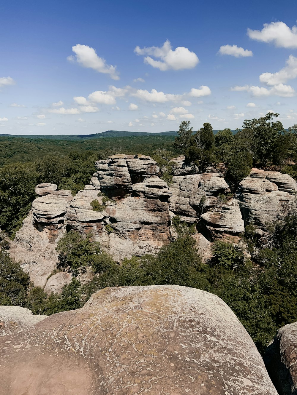 brown rocky mountain under blue sky during daytime