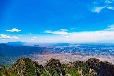 green trees on mountain under blue sky during daytime new mexico zoom background