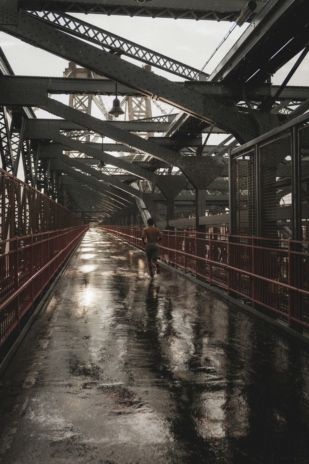 red metal bridge over river