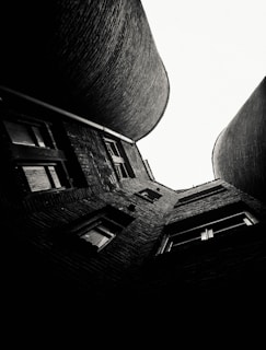 grayscale photo of concrete building