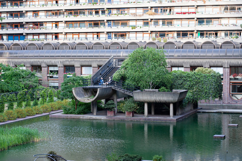 white concrete building near body of water during daytime