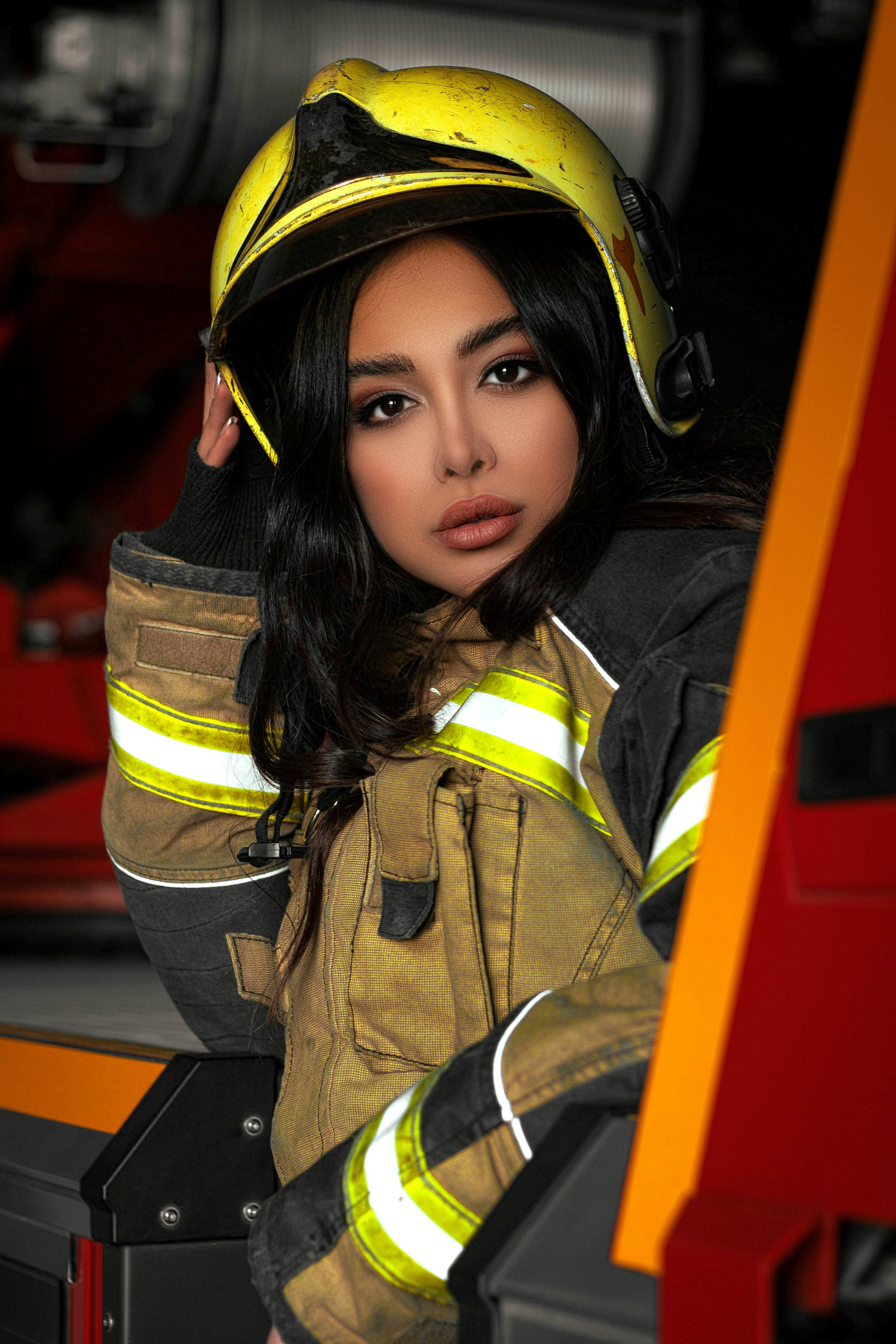 woman in brown jacket wearing black helmet