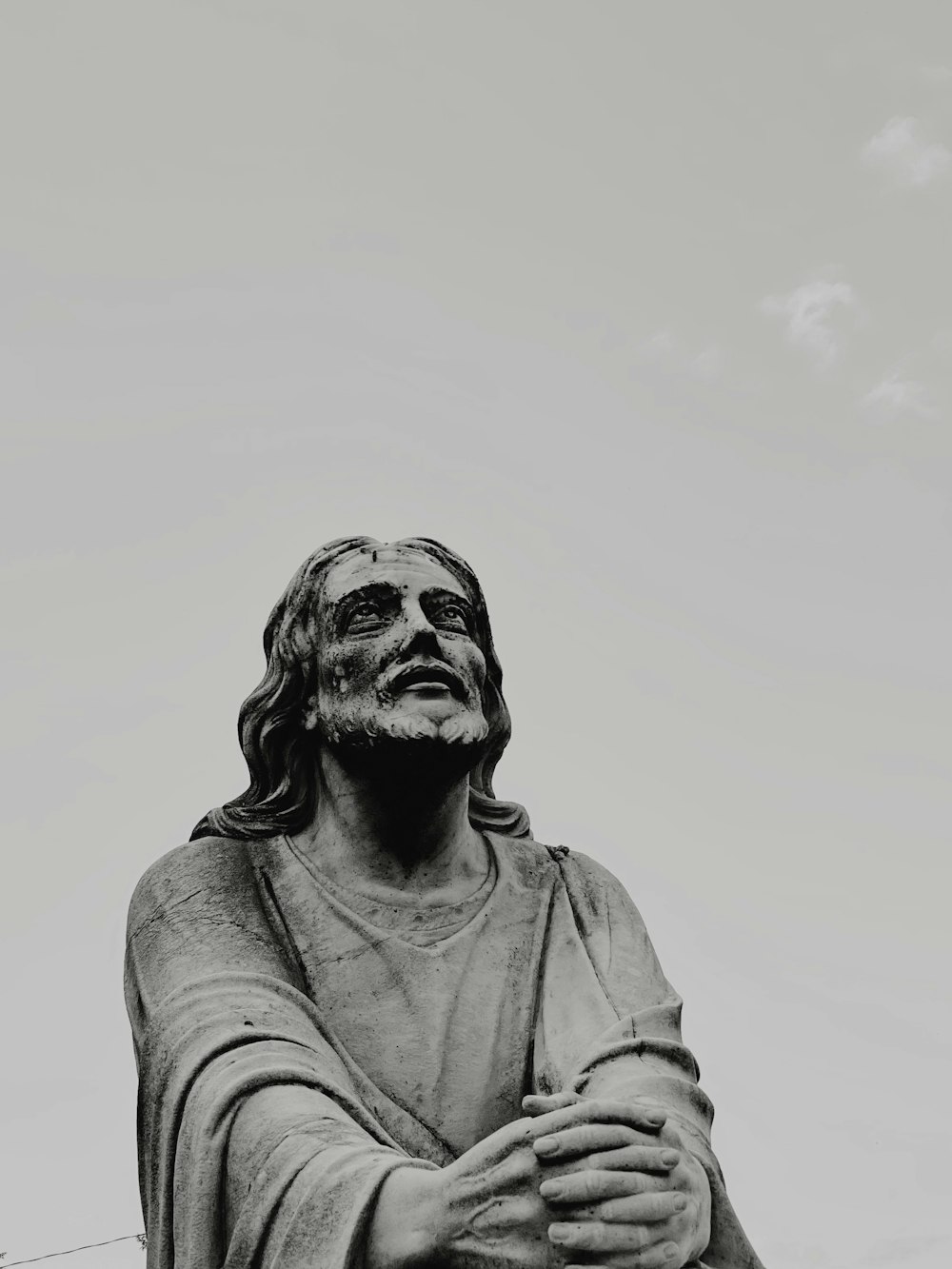 grayscale photo of man in leather jacket