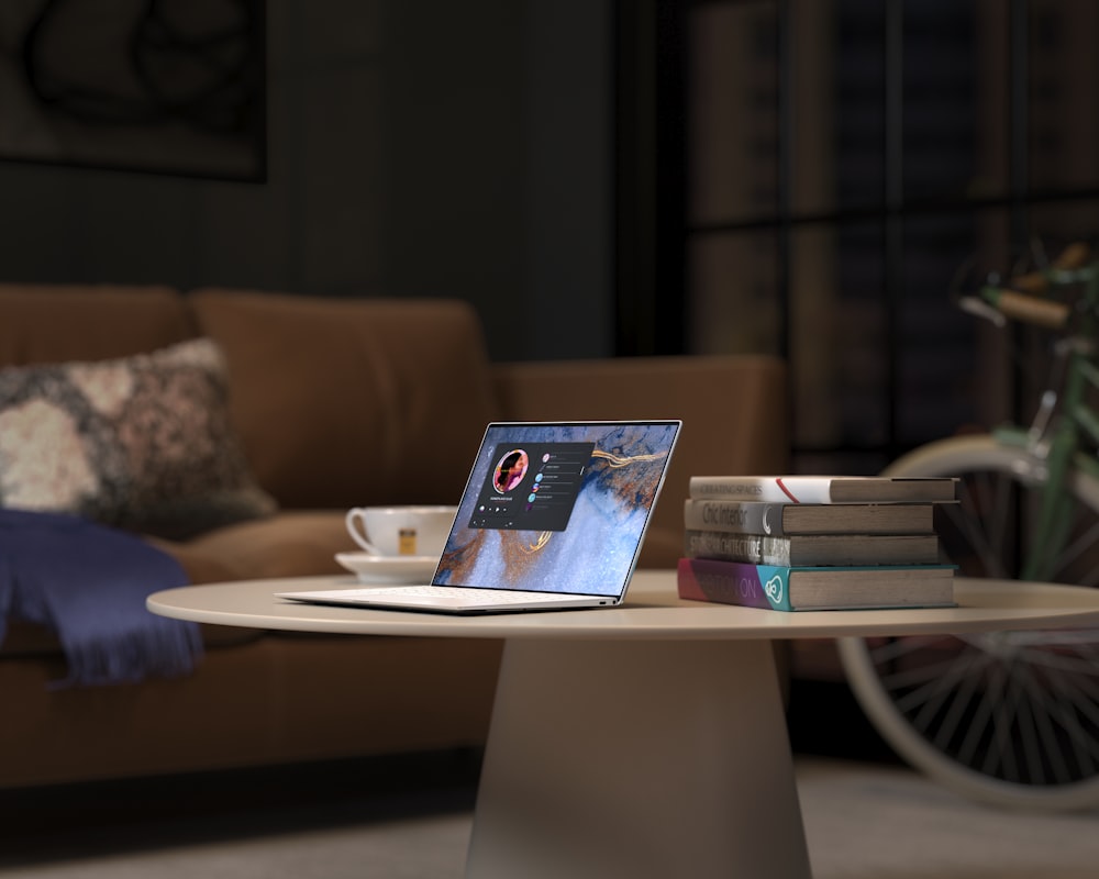 laptop on brown wooden table