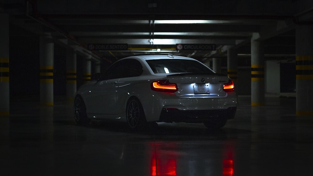 black sedan on road during night time