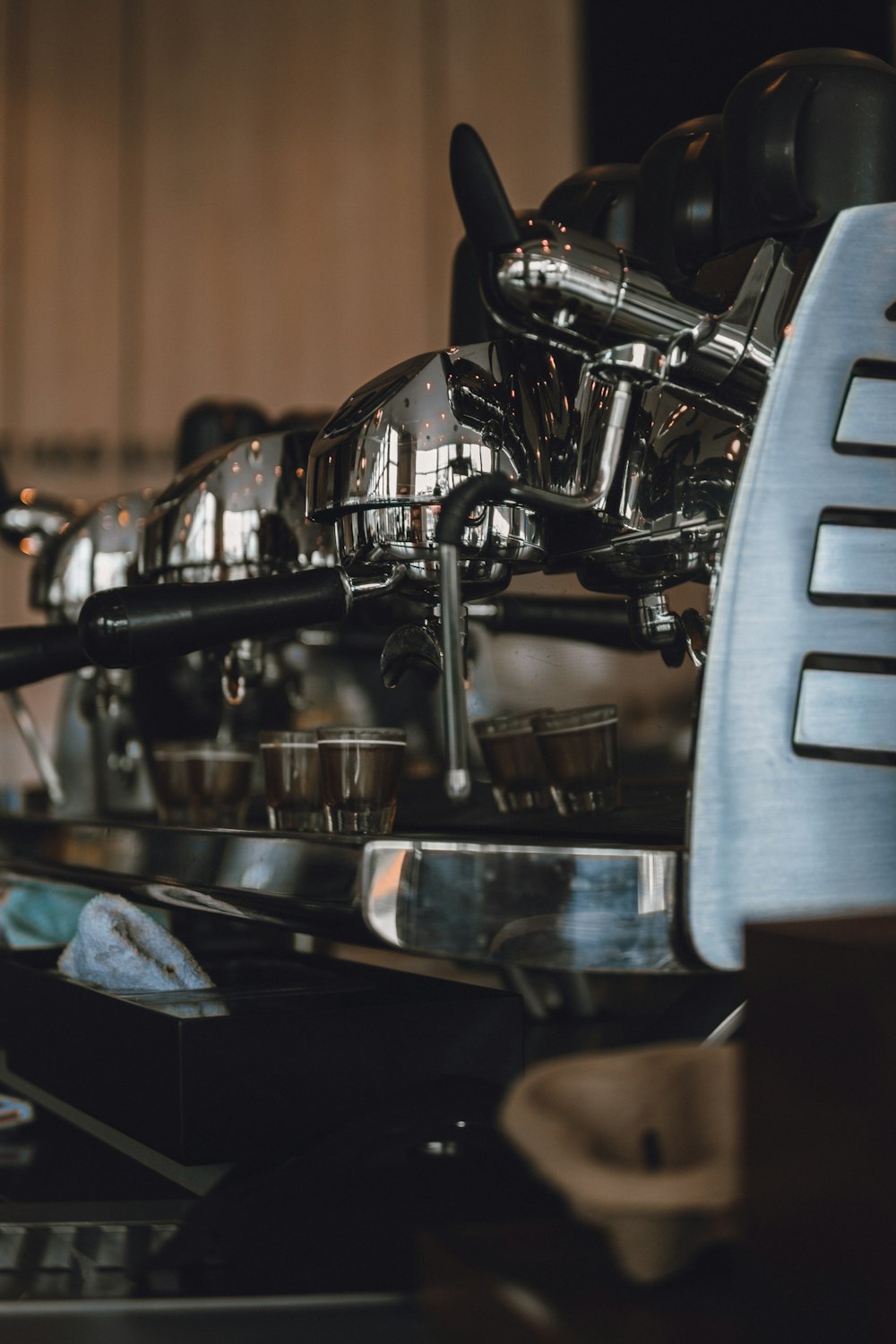 stainless steel espresso machine on table