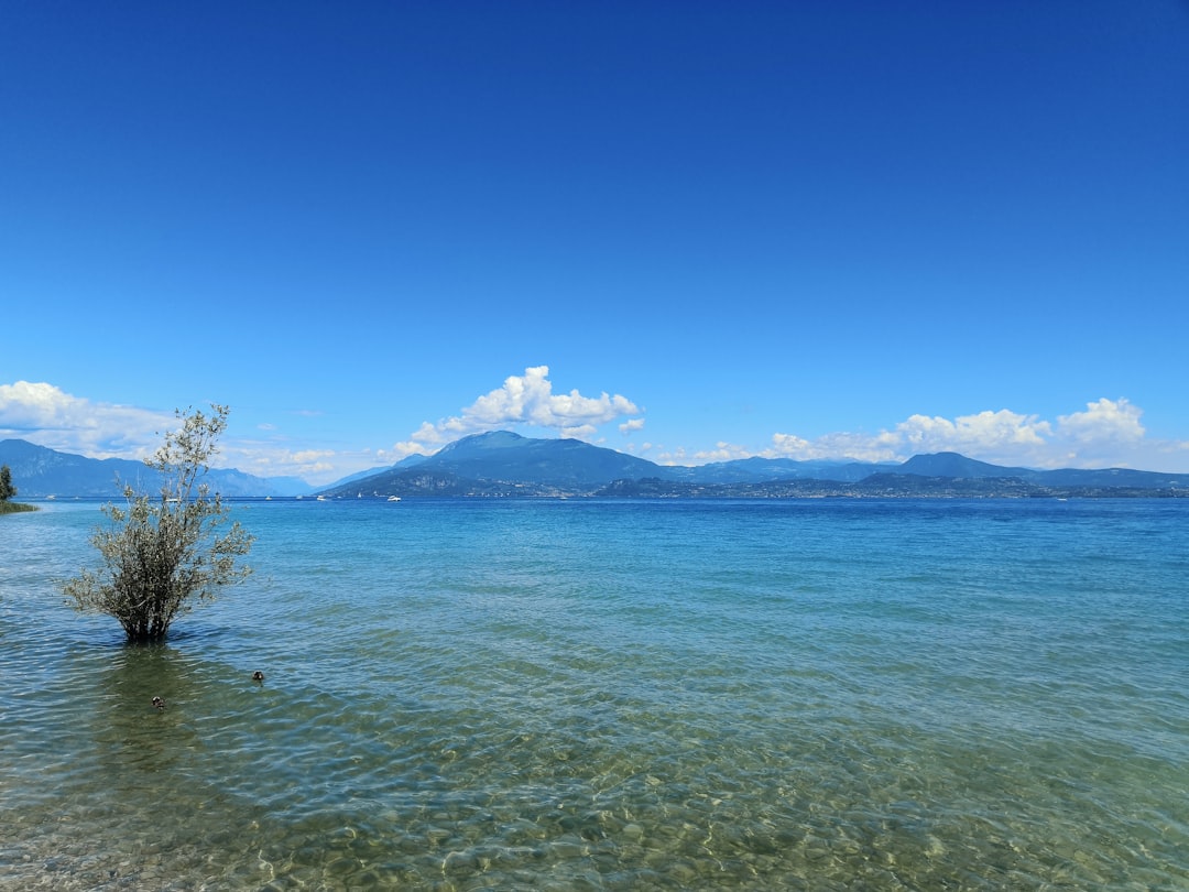 blue sea under blue sky during daytime