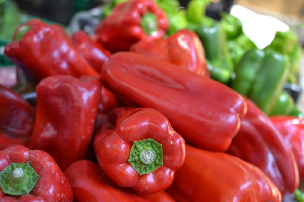 red bell pepper on brown wooden table