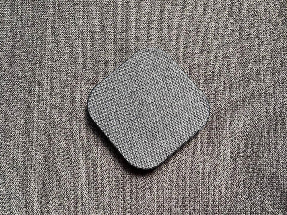 gray square pad on brown textile