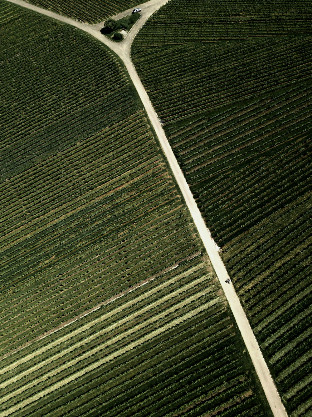 white metal bar on green textile