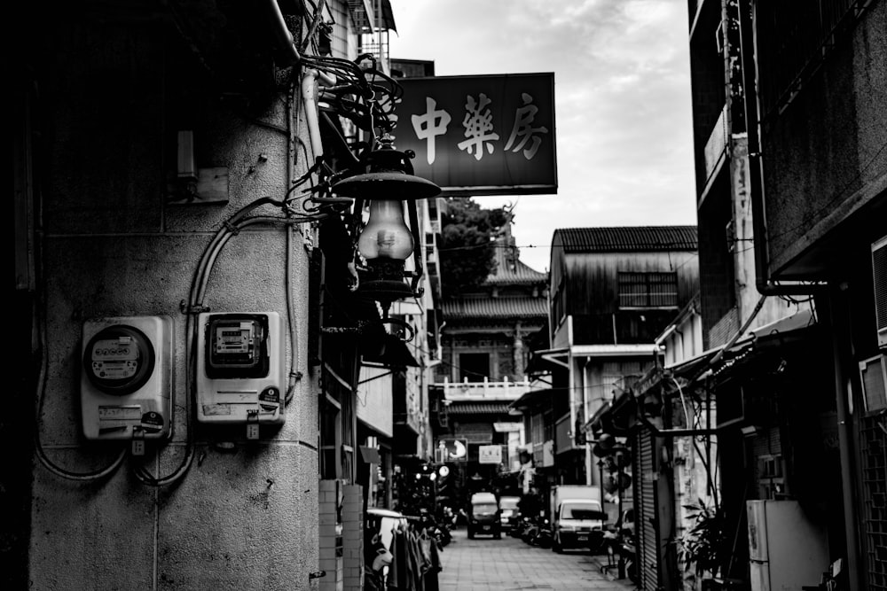 grayscale photo of city buildings