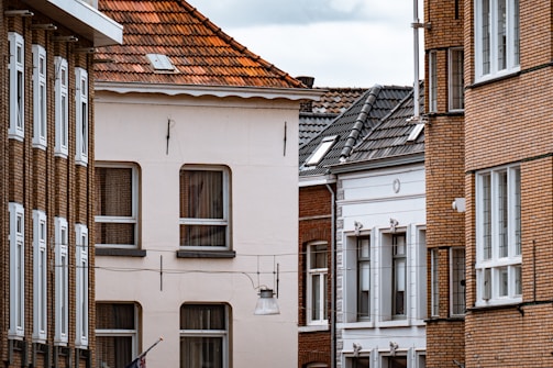 Urban residential remodeling project showing before and after views.
