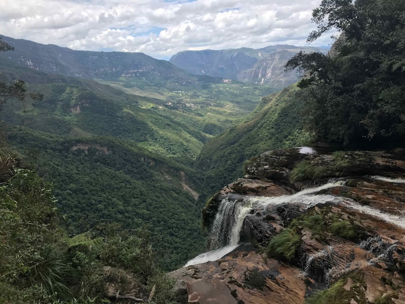 Gocta Falls cascading into lush cloud forest valley in Northern Peru