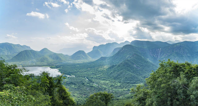 Green mountains under white clouds on the way to Kodaikanal, Tamil Nadu
