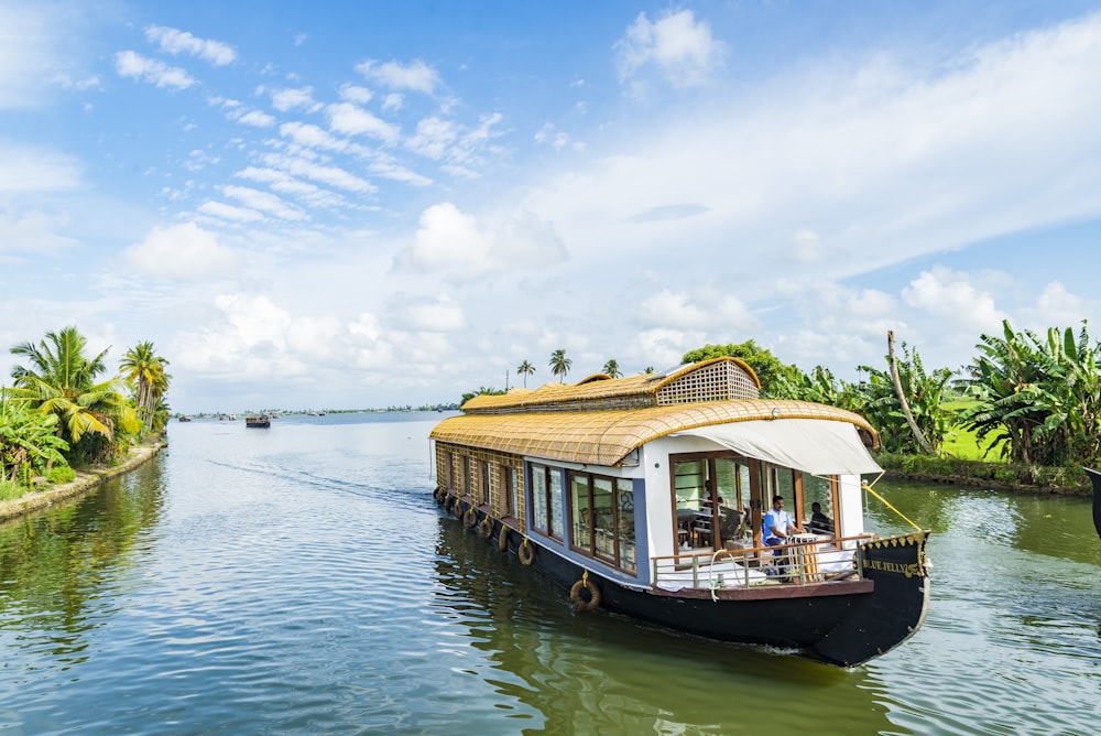 brown wooden boat on water during daytime