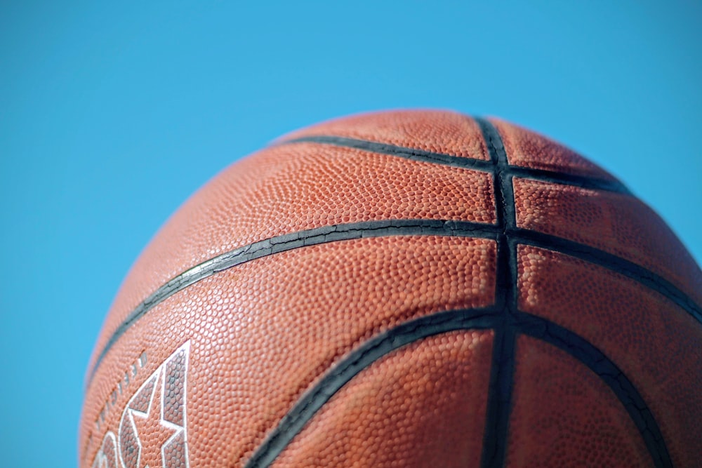 brown basketball under blue sky during daytime
