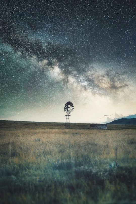 green grass field under blue sky with stars during night time in Volksrust South Africa